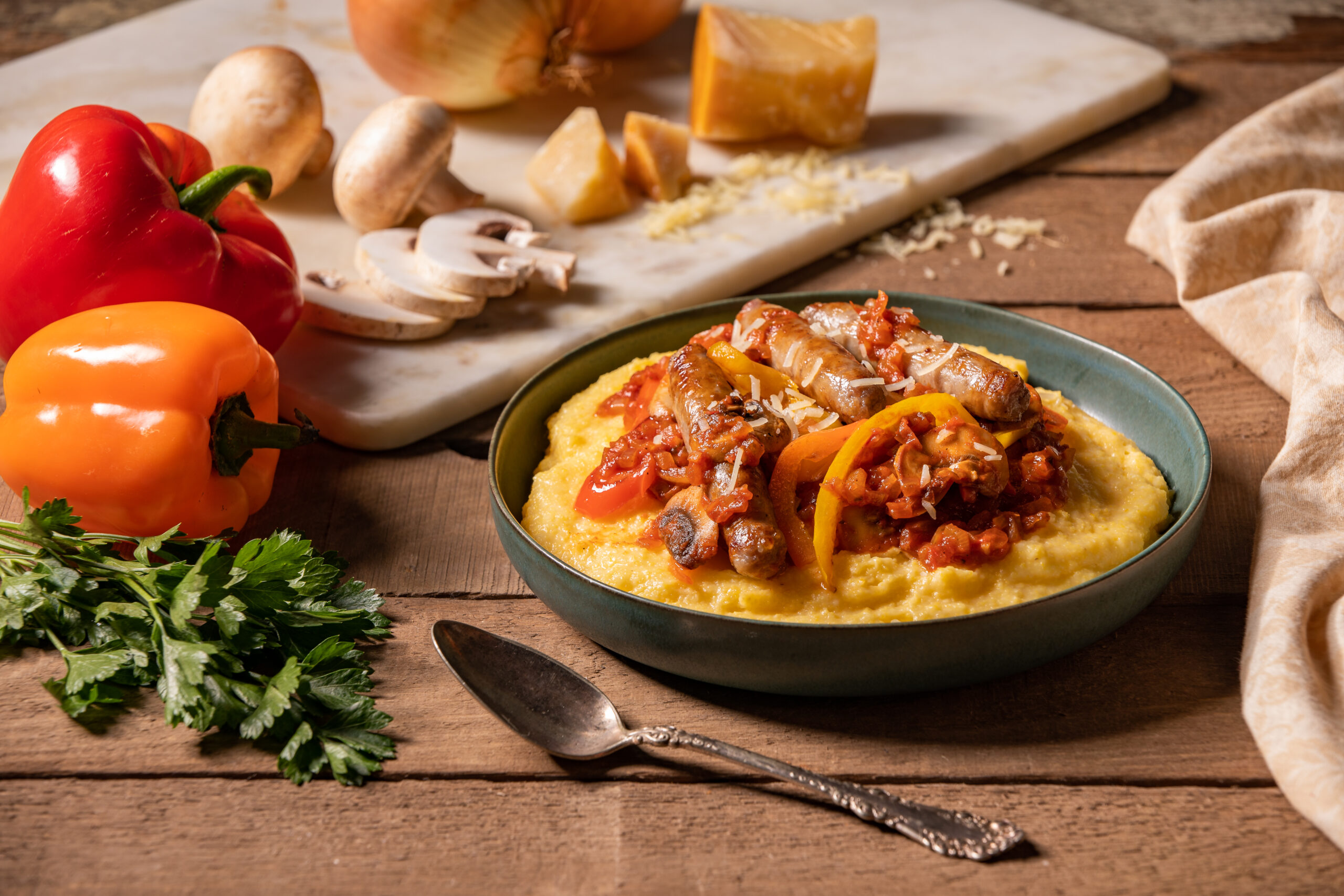 Spolumbo's Sausage with Peppers, Onions and Creamy Polenta - Calgary Co-op